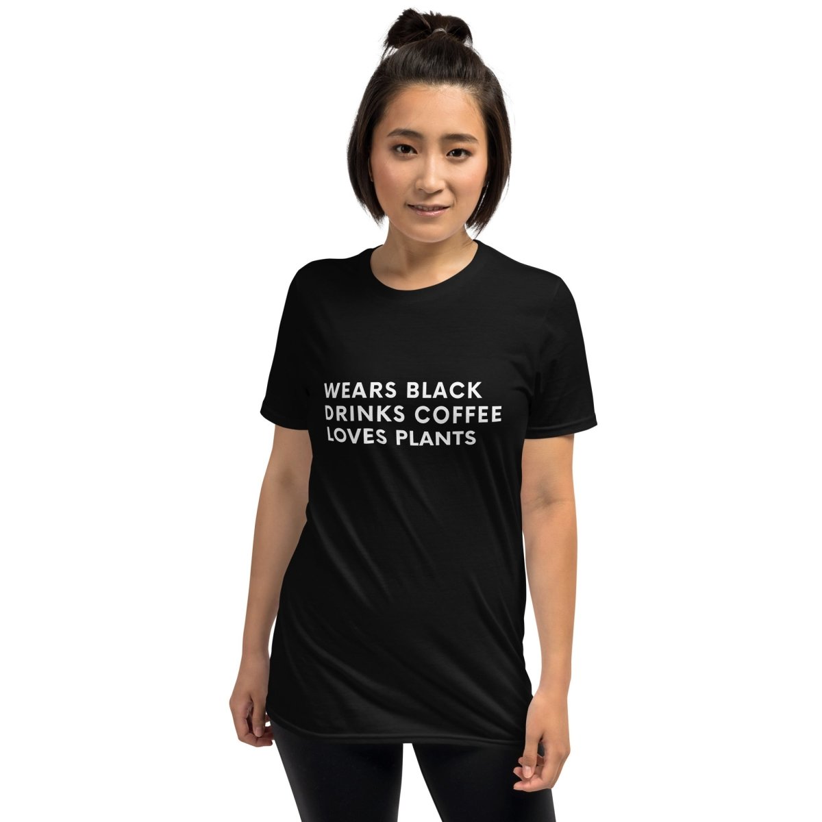 Wears Black. Drinks Coffee. Loves Plants. Short-Sleeve Unisex T-Shirt - Cotton Plus Cream